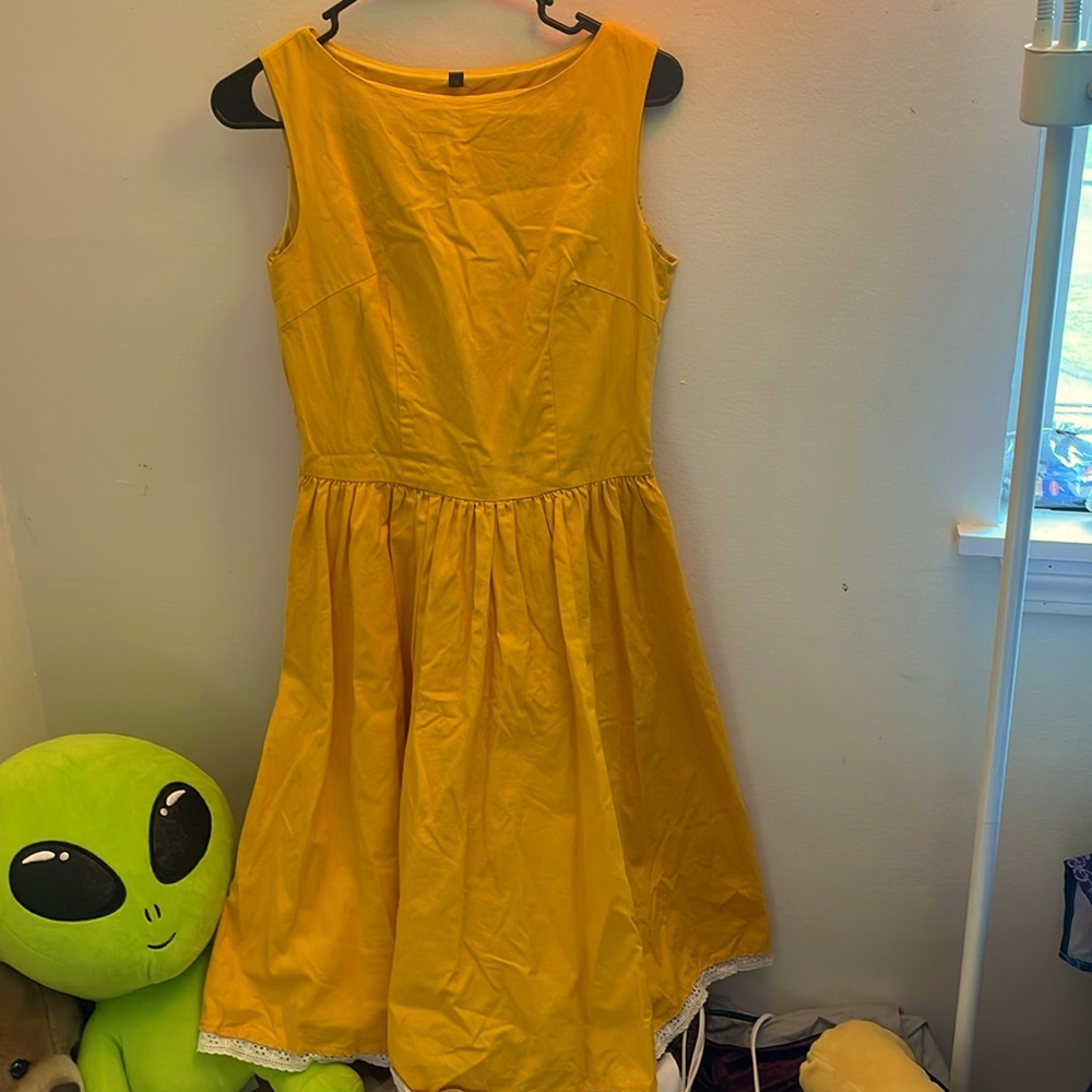Yellow 50's style dress. Worn once- could use an iron